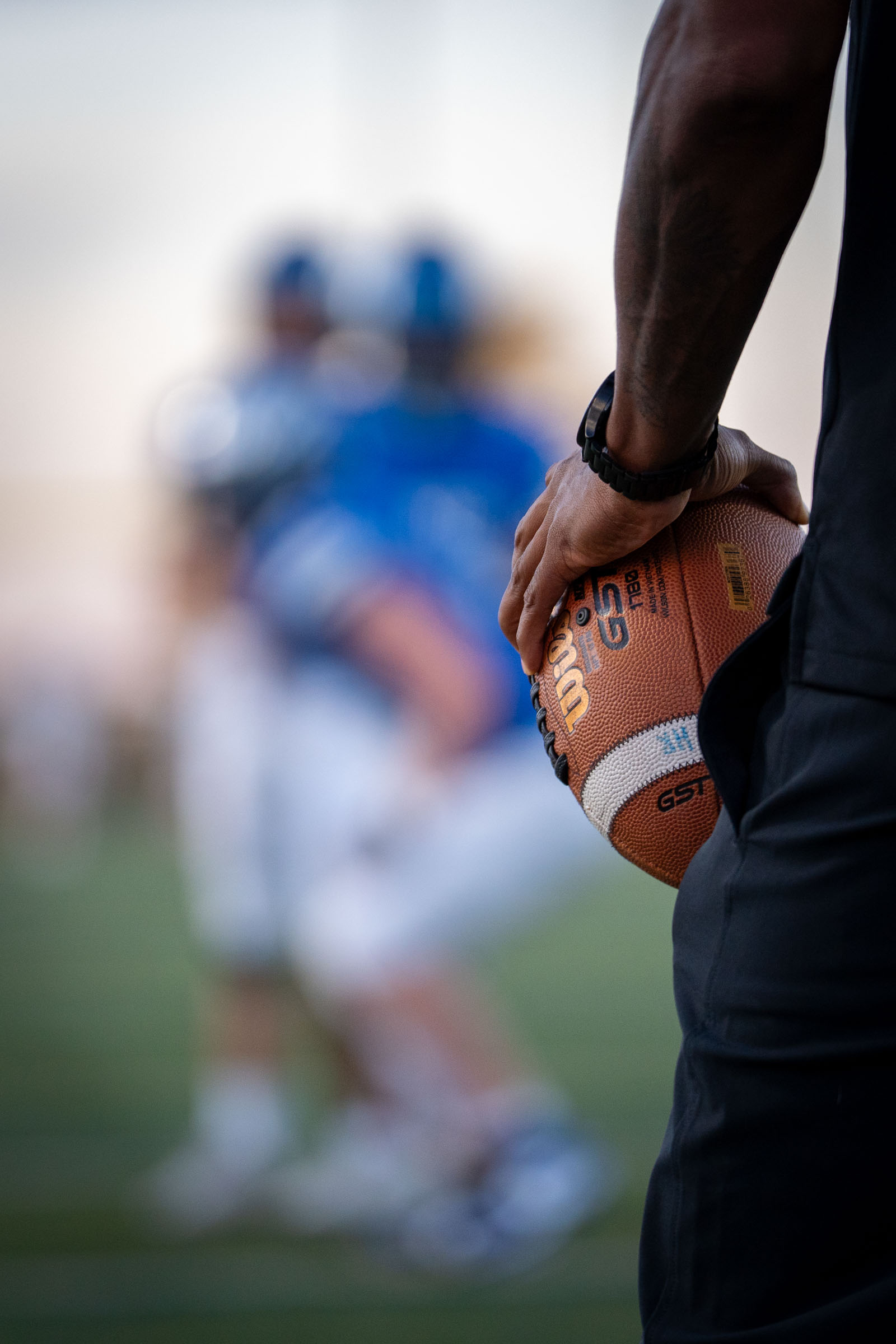 Varsity football action under the lights, Denver metro